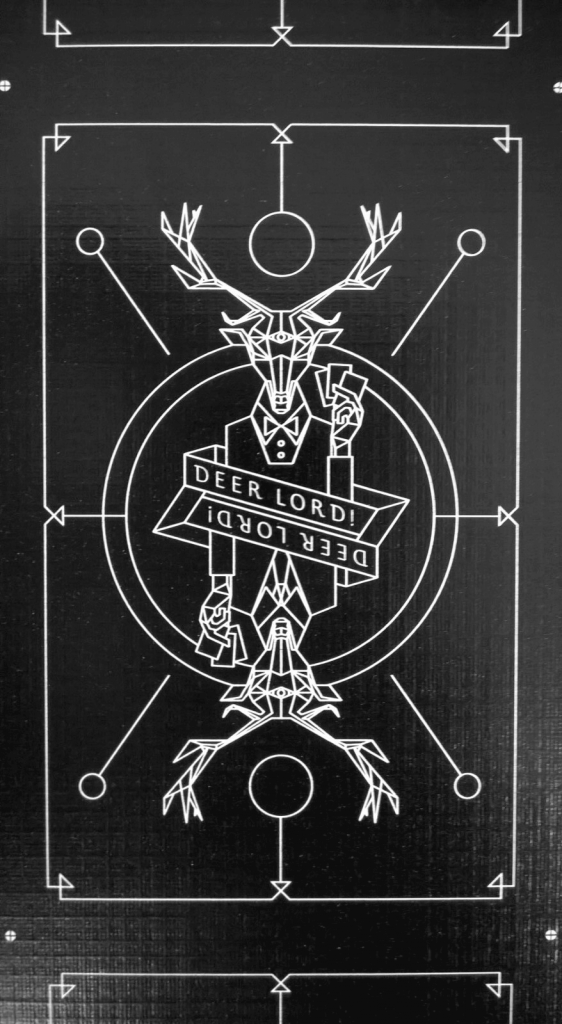 close up of a DEER LORD card on a sheet front view